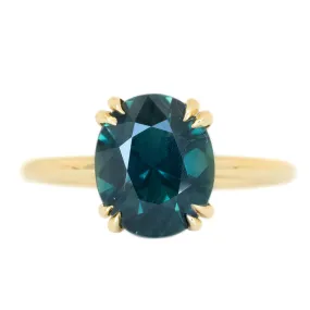 3.02ct Oval Deep Teal Green Sapphire Double Pronged Solitaire in 14k Yellow Gold