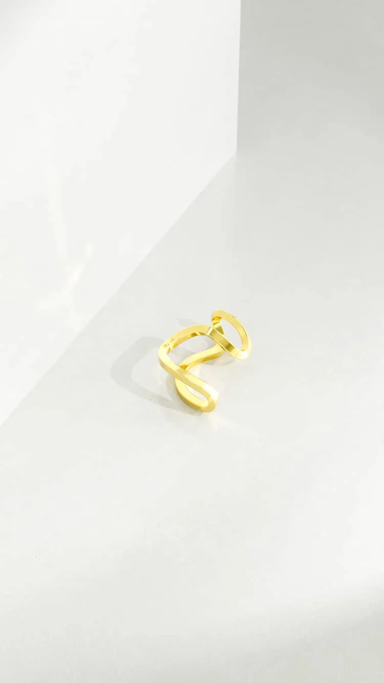 Asymmetric gold ear-cuff