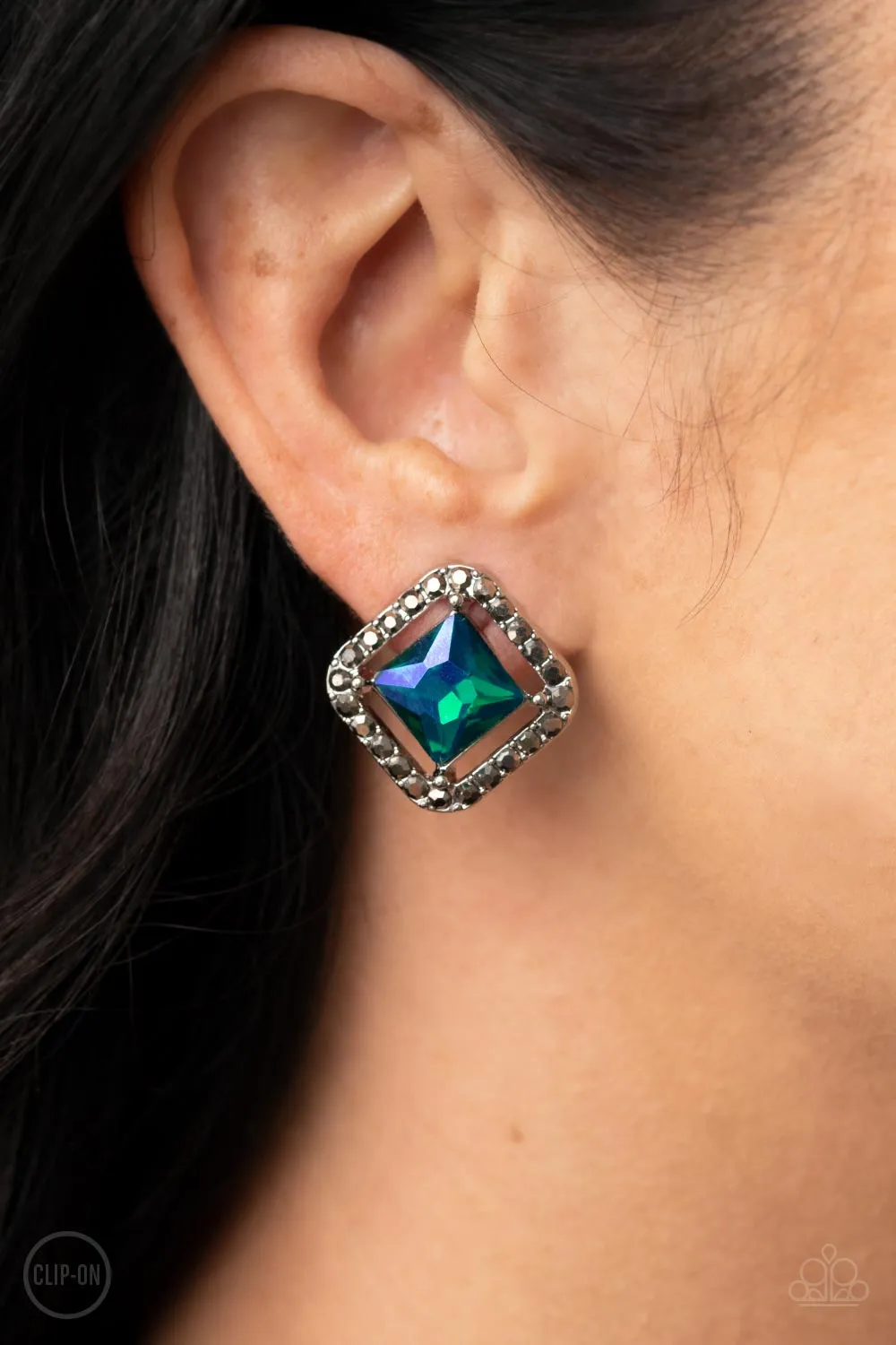 Cosmic Catwalk Green Clip On-Earrings