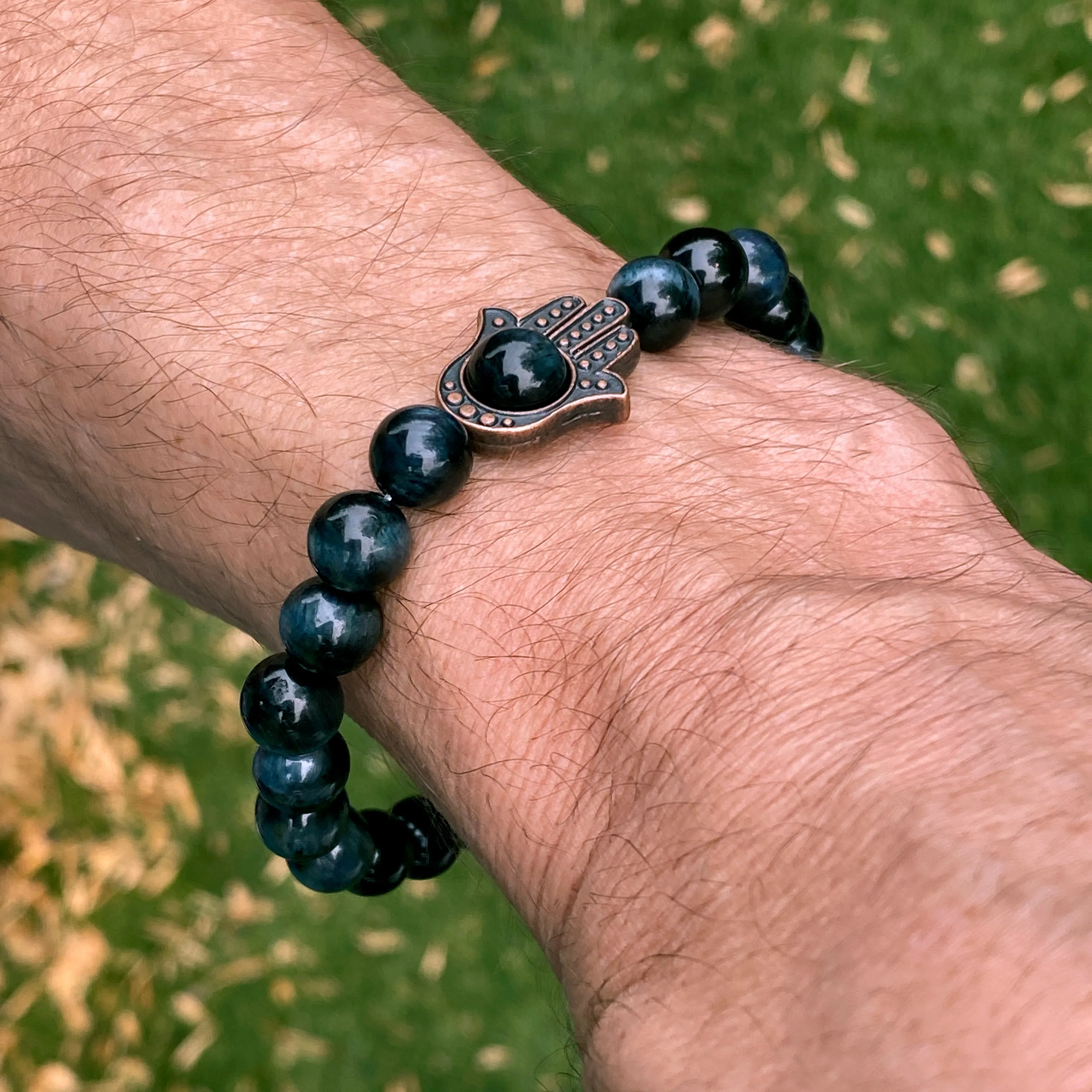 Men's Tiger Eye gemstone and copper Hamsa bracelet.