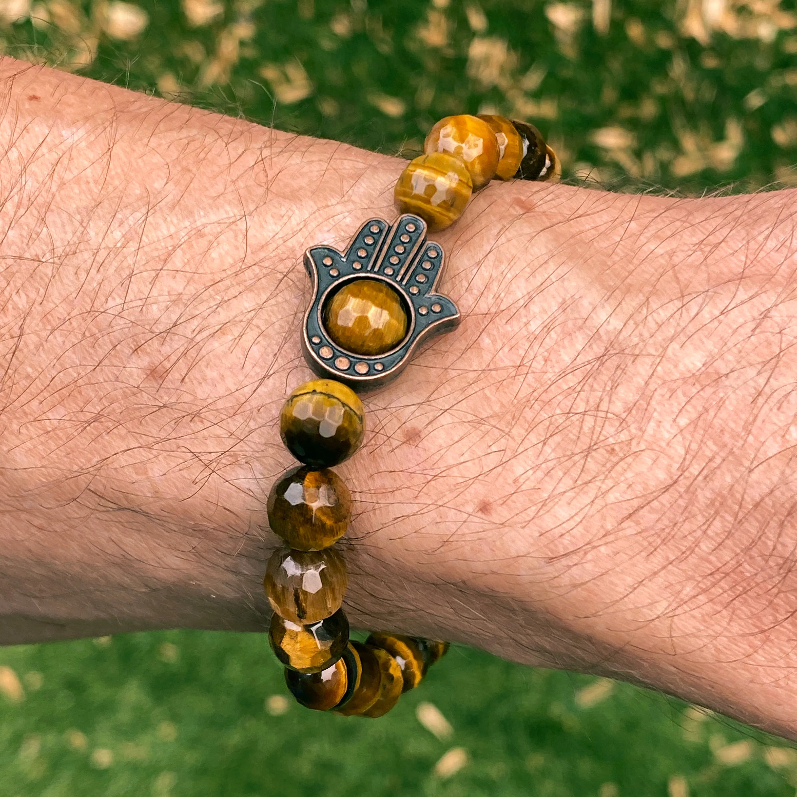 Men's Tiger Eye gemstone and copper Hamsa bracelet.